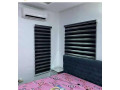 transform-your-space-with-dual-functionality-light-filtering-day-and-night-blinds-small-1